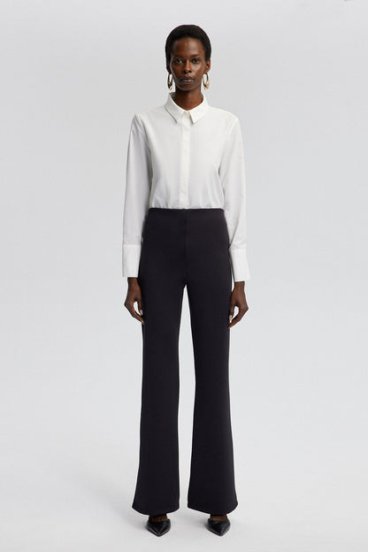 MID-RISE FLARE TROUSERS