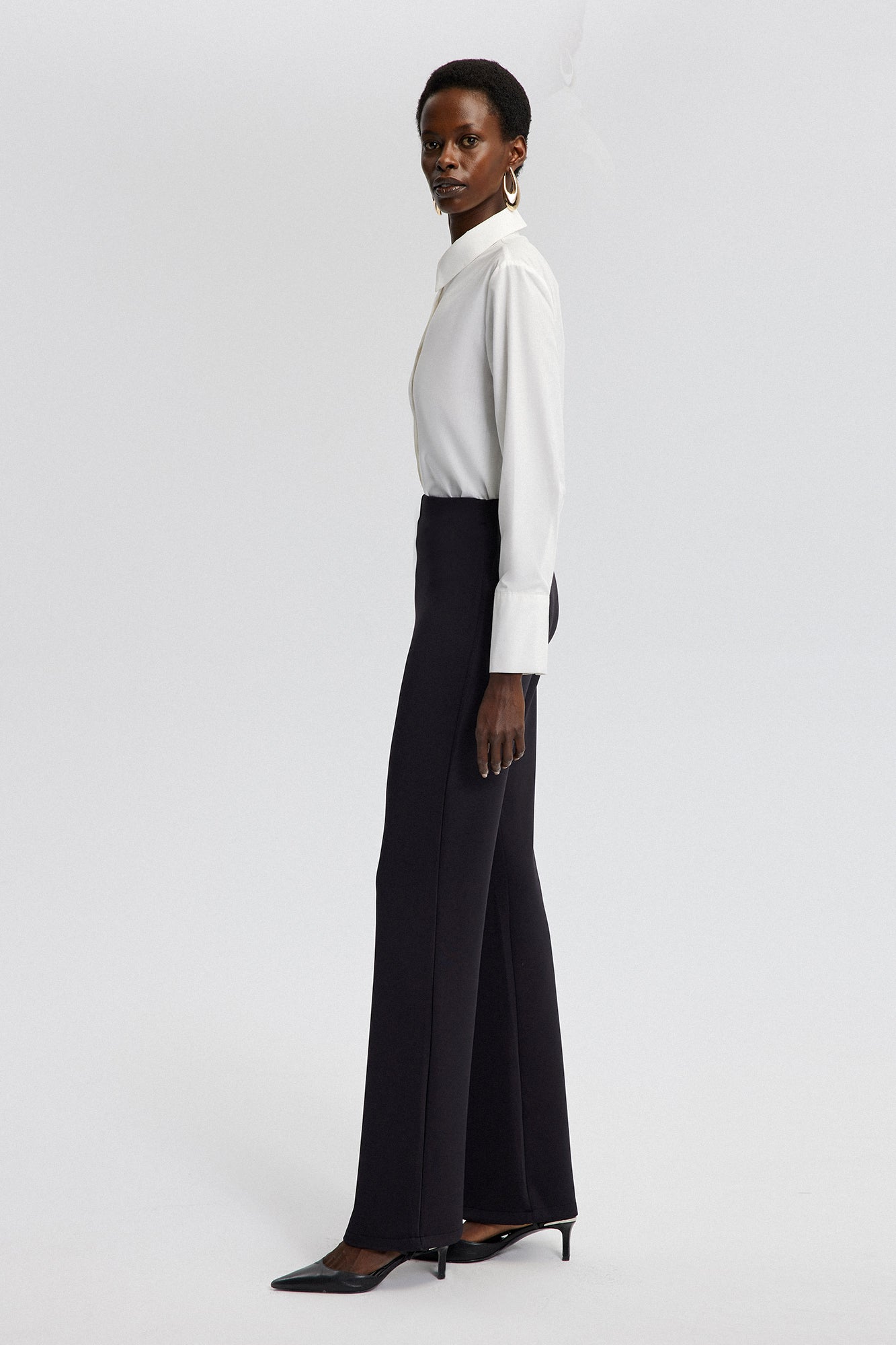 MID-RISE FLARE TROUSERS