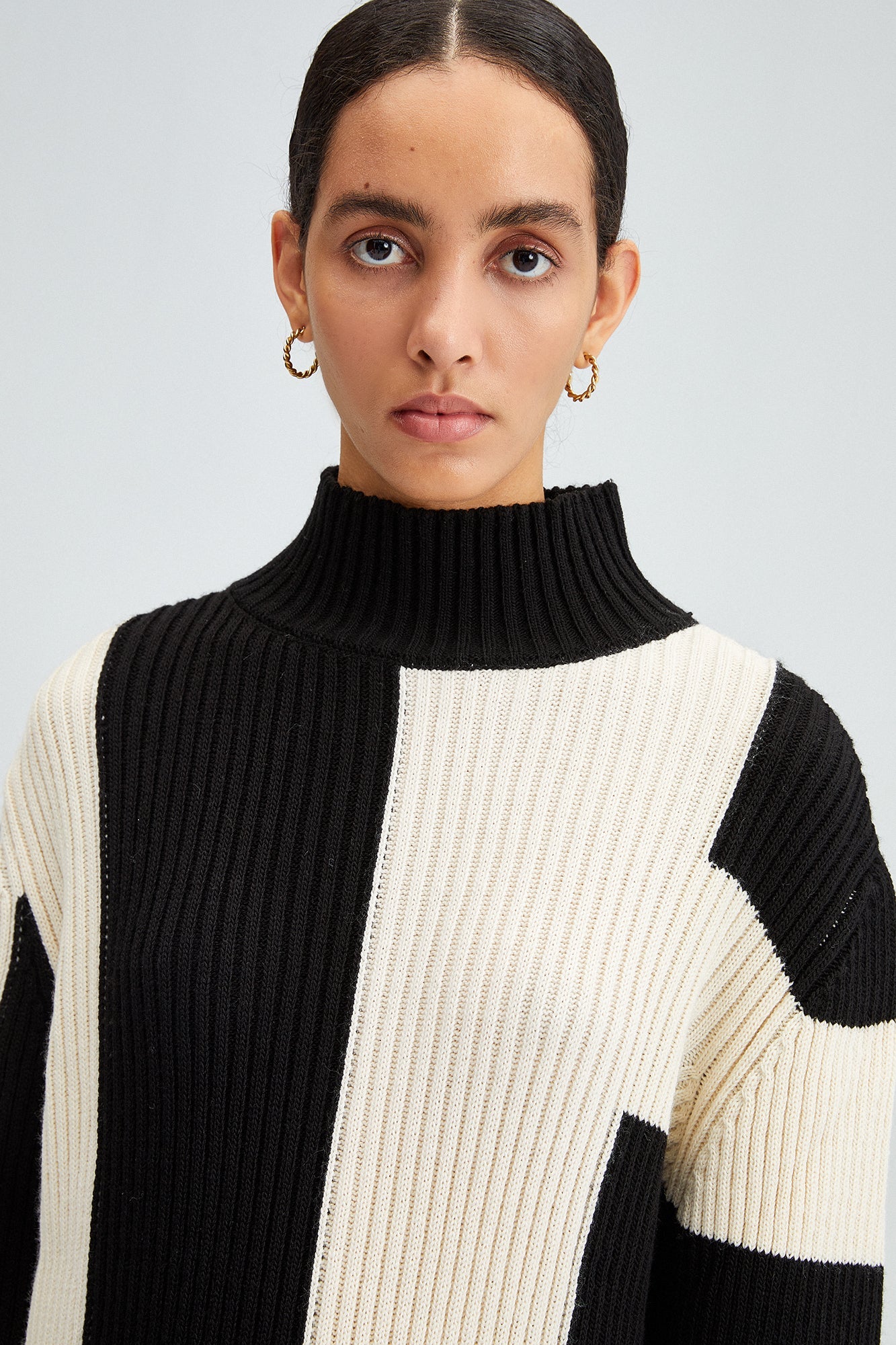 ASYMMETRIC STRIPED SWEATER